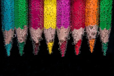 Colorful pencils submerged 4k abstract wallpaper