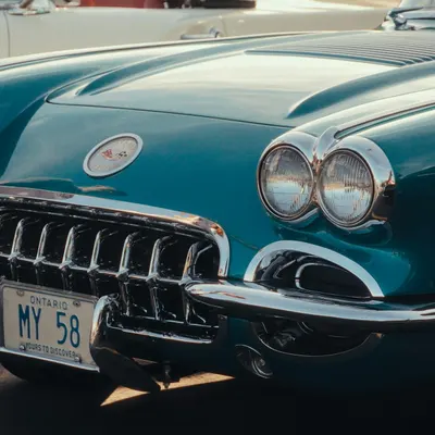 A striking aqua blue 1958 classic car photographed outdoors in Toronto, showcasi 4k aesthetic wallpaper