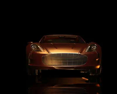 Front view of a luxurious sports car in a dark setting, showcasing elegance and  4k cars wallpaper