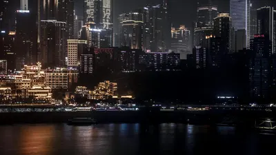 Illuminated Chongqing skyline at night showcasing bright city lights and tall sk 4k city wallpaper