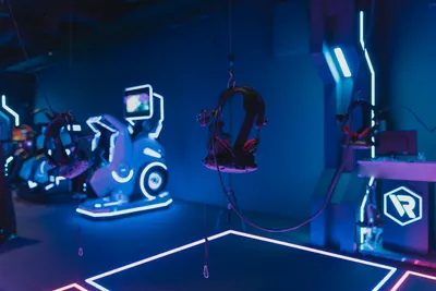 Immersive VR gaming setup with neon lights showcasing advanced technology. 4k gaming wallpaper