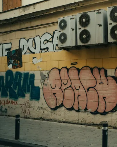 Vibrant street art featuring graffiti and pixelated Mario on an urban wall with  4k gaming wallpaper