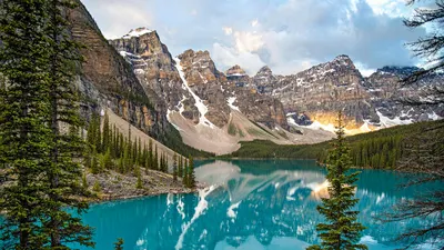 Breathtaking view of Moraine Lake with reflection of snow-covered mountains, pin 4k lake wallpaper