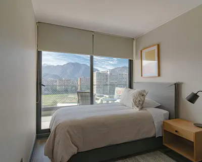 Contemporary bedroom featuring a mountain view through large windows, spacious a 4k minimal wallpaper