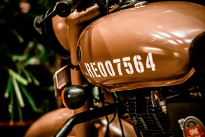 Close-up shot of a vintage motorcycle showcasing its retro design and nostalgic  4k motorcycle wallpaper