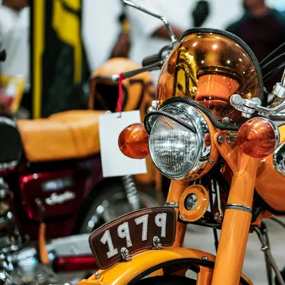 Detailed view of a classic 1979 Yamaha motorcycle at an exhibition. 4k motorcycle wallpaper