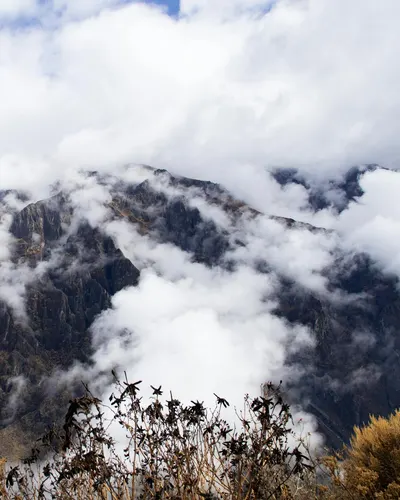 Scenic view of mist-covered mountains in Cabanaconde, Arequipa, Peru. 4k mountain wallpaper