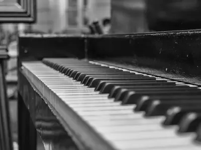 Artistic black and white close-up of piano keys in shallow depth of field. 4k music wallpaper