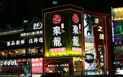 Captivating urban scene with neon signs illuminating a lively Asian street at ni 4k neon wallpaper