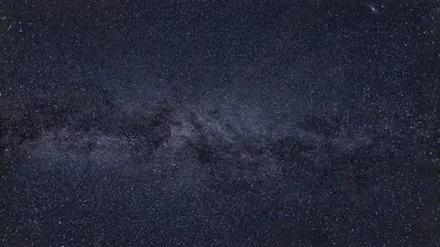 A breathtaking view of a starry night sky showcasing the Milky Way and countless 4k space wallpaper