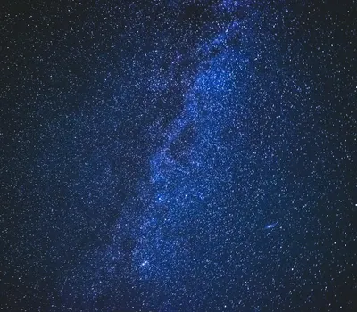 A stunning view of the starry night sky showcasing the Milky Way galaxy in vivid 4k space wallpaper