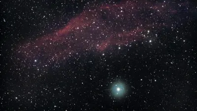 Explore the vibrant colors and stars of a cosmic nebula in deep space. 4k space wallpaper