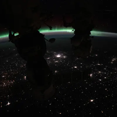 The aurora borealis crowns Earth's horizon above Canada hd space wallpaper