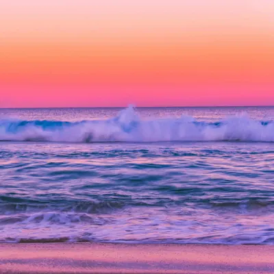 Stunning sunset view with vibrant hues over ocean waves at The Entrance North, N 4k sunset wallpaper